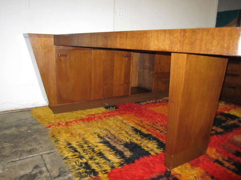 Amazing 4 Piece Gilbert Rohde style desk credenza set. This is one of the most fantastic sets i have come across in some time.   A complete wrap around man men desk.  I am certain you will feel like Dan Draper himself sitting behind this mid-century