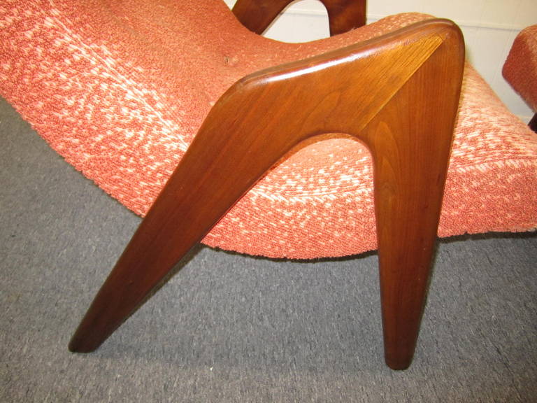 Excellent pair of Adrian Pearsall sculptural walnut lounge chairs.  Awesome form and function-these chairs look more like a work of art than a piece of furniture.  These will need reupholstery but i know that what you designers are looking for