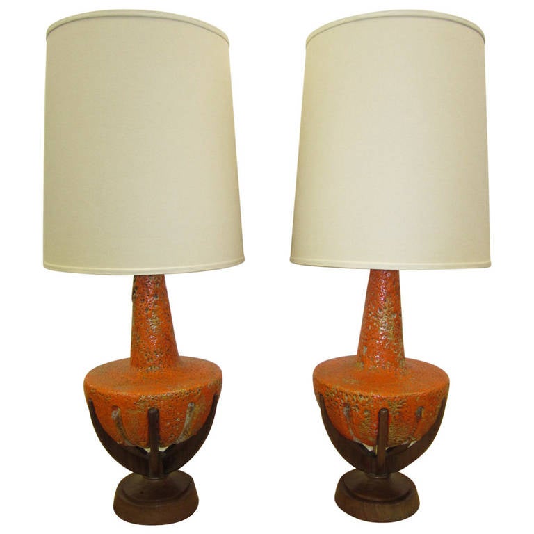 Amazing Pair of Thick Lava Glaze Orange Ceramic Lamps with Walnut Finger Bases For Sale at 1stdibs