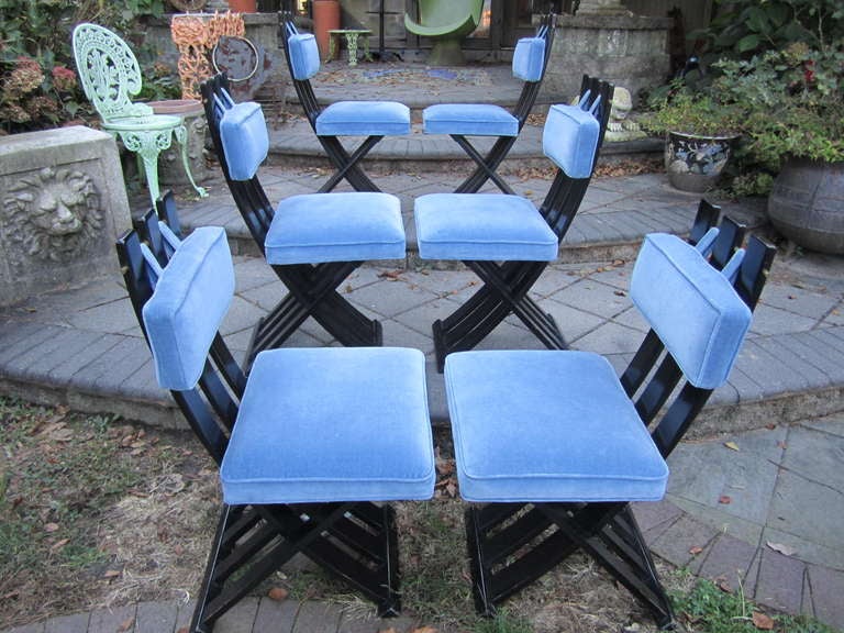 Set of six X-base dining chairs by Harvey Probber. Brass hardware contrasts and compliments the dark ebonized mahogany. Cushions are in nice vintage condition and are easily reupholstered if need be. I love the cool blue velvet pads against the