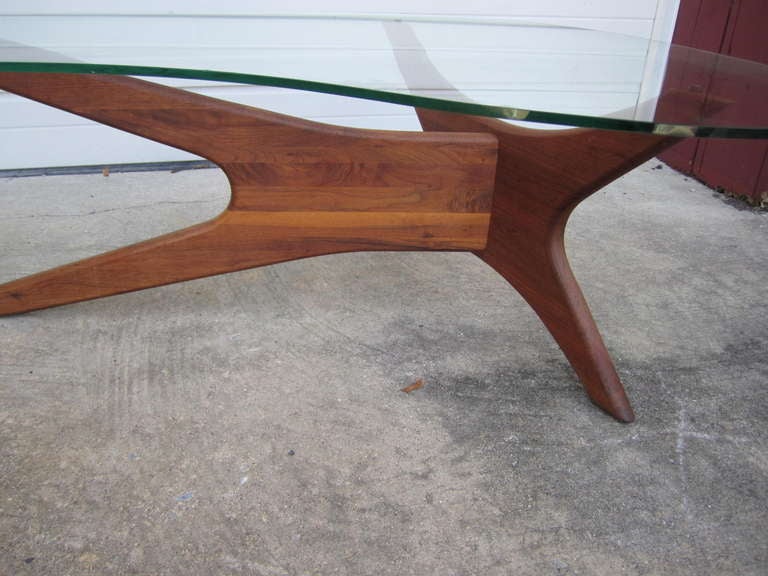 Mid-century coffee table designed by Adrian Pearsall for Craft Associates, ca. 1960s, with original boomerang plate glass top. This lovely piece is original vintage condition and still looks great.