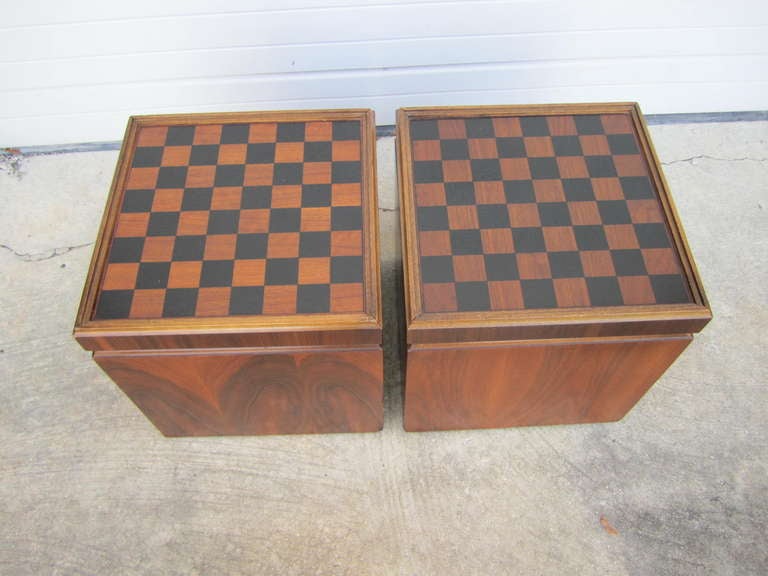Very unusual pair of Lane rolling chess board storage stools.  You will love the great flip top stool/chess board seats and   wonderful storage underneath the removable top.  There are small rollers on the bottom to allow them to scoot around.