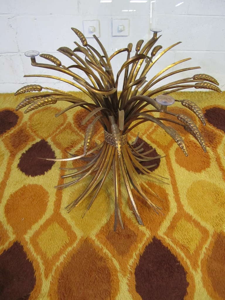 Gilded sheaf of wheat coffee table designed by Coco Chanel. Great  gilded gold base of bundled wheat with round glass top.