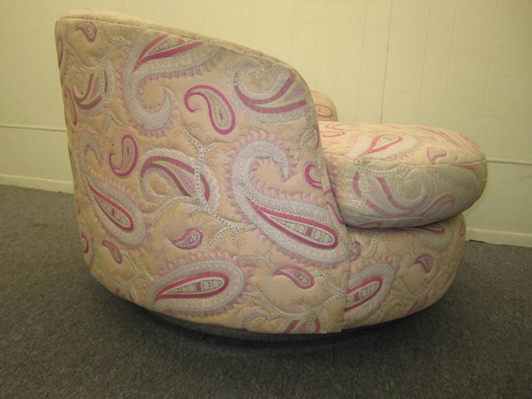 Fabulous oversized circular Milo Baughman swivel lounge chair. Will need new upholstery but the swivel base has been chromed for added sparkle.  Perfect statement chair for you designers who need to reupholster with your clients favorite fabric.