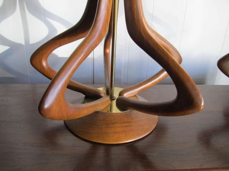 Excellent pair of sculptural walnut star of david super tall lamps.  Well crafted with delicately carved solid walnut arms forming a lovely star.  You will love the scale and quality of this exceptional pair.These spectacular lamps are a whopping
