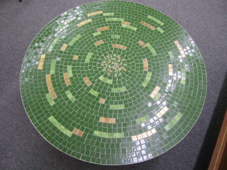 Fabulous circular tile top coffee table with lovely shades of green and gold.  Nice size at 36
