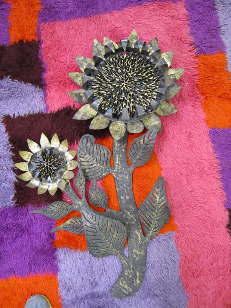 Stunning large scale C Jere sunflower wall sculpture.  Nicely detailed brutalist style sunflowers with textured  torch cut steel stalks and leaves.  This is one of the more rare wall sculptures by Jere and very well crafted.