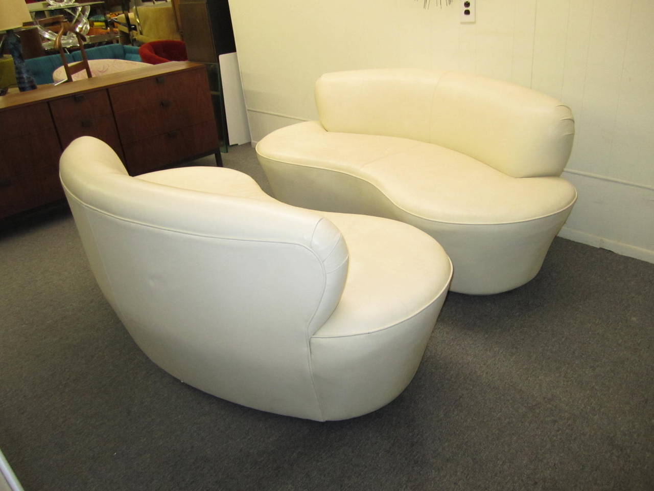 kidney shaped leather sofa