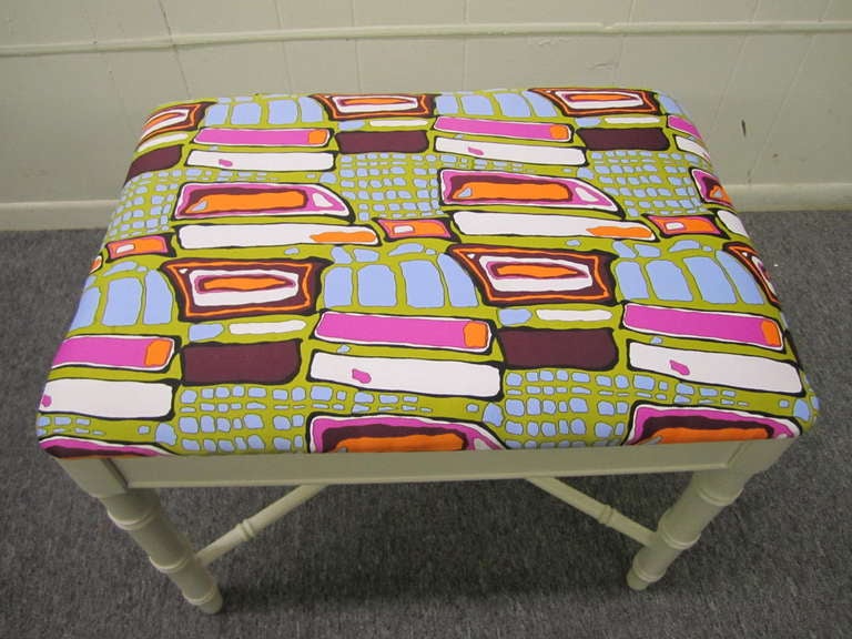 Gorgeous Pucci style white faux bamboo vanity bench.  The fabric is stunning and looks to newly reupholstered  in a outrageous Pucci style heavy silk.  The bench is labeled Thomasville on the underside.