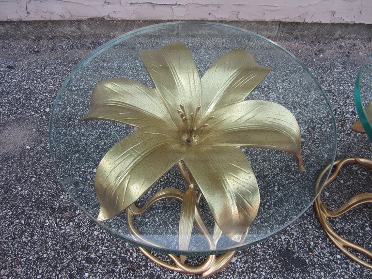 Gorgeous pair of Arthur Court style gilded aluminum lily side tables. These tables are actually made by Drexel from their 'ETC. Collection,' circa1970. Add glamour to any room with this stunning pair of sculpted lily side tables with super thick