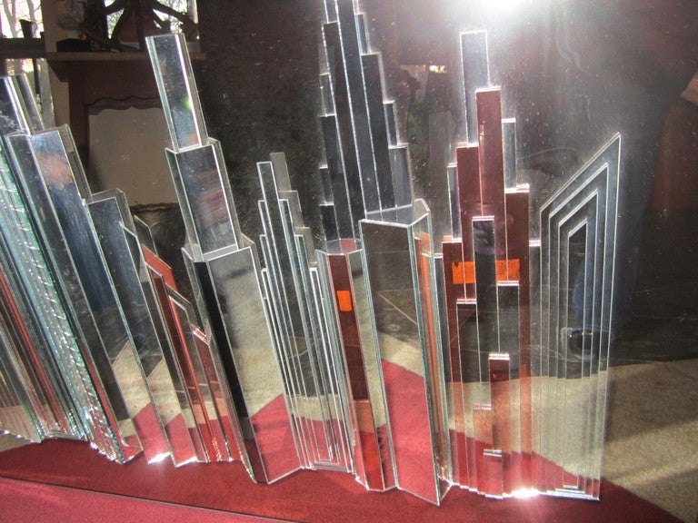GORGEOUS HARVARDS REFECTIONS 3-D MIRROR SCULPTURE OF THE NEW YORK CITY SKYLINE.  THIS AMAZING MIRRORED SCULPTURE IS VERY WELL DONE AND LOOKS GORGEOUS IN PERSON.  THE TWO ARTISTS THAT CREATED THIS MASTERPIECE STILL DO WORK BUT THIS PIECE WAS CREATED