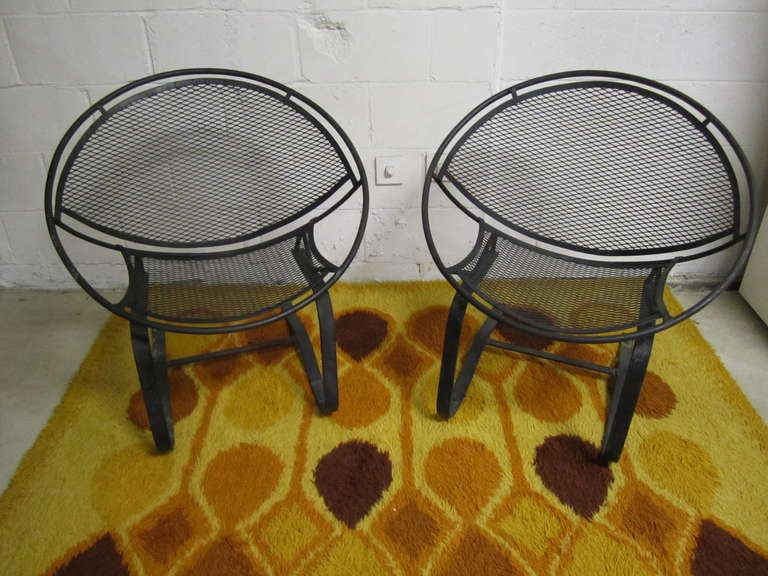 Fabulous pair of cantilevered Patio Chairs by Salterini. This pair is in excellent vintage condition.  I do have another pair painted black if you need 4.  please see all my vintage patio pieces on 1stdibs.