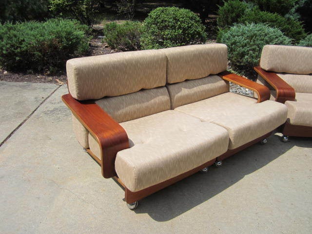 RARE N.EILERSEN DANISH MODERN BENTWOOD TEAK LOVESEAT.  THIS PIECE IS VERY RARE AND IS PART OF A SET THAT I AM OFFERING HERE ON 1STDIBS.  THE ORIGINAL OWNER BOUGHT THIS LOVESEAT ALONG WITH THE REST OF THE SET IN 1972 FROM A HIGH END DANISH STORE. 