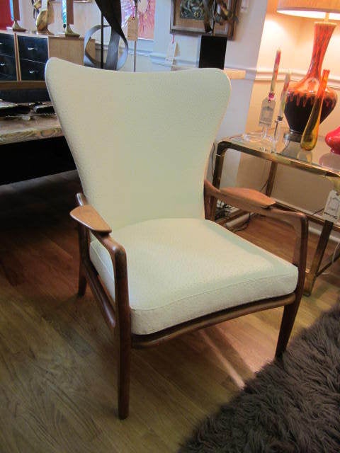 Outstanding tall wing back sculptural walnut lounge chair.  Wow is what you say when you see this beautifully restored pearsall chair.  First you just have to touch the faux ostrich leather.  Hard to tell if it is real or not.  This is a very high