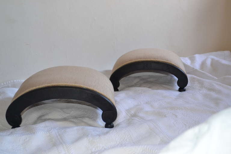 Pair of small foot stools with new linen upholstery