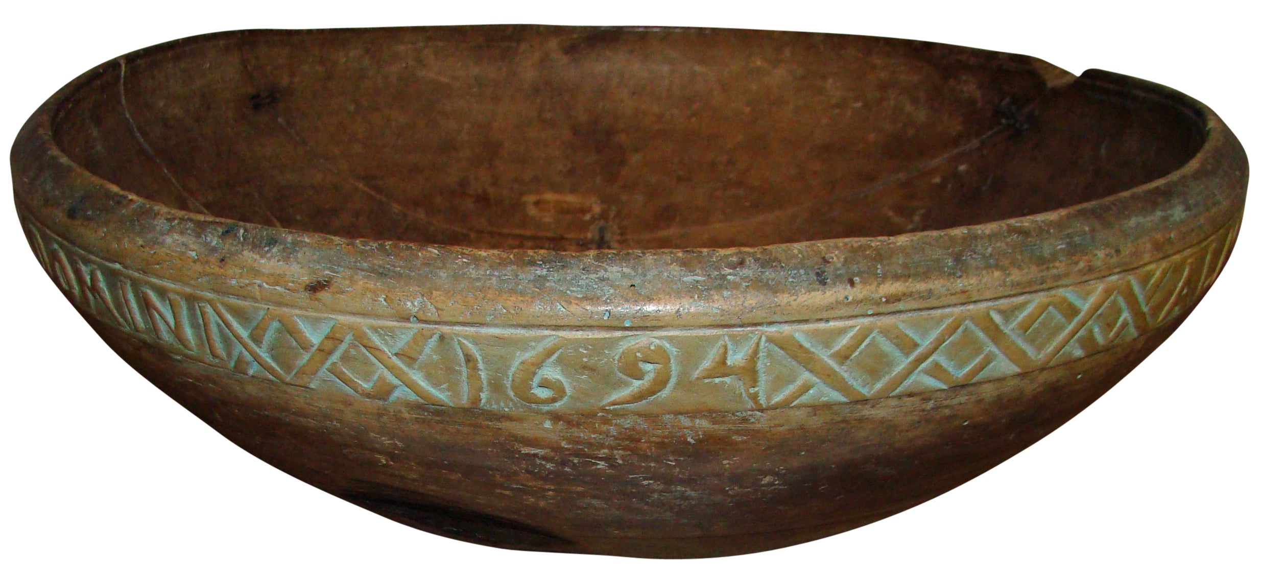 Large wooden bowl, dated 1694 and inscribed with two names. Probably for celebrating marriage between 