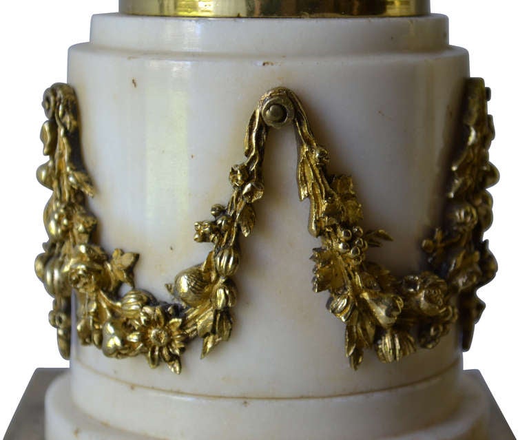 Pair of beautiful 19th century lamps with ormolu decorations on the marble base. 