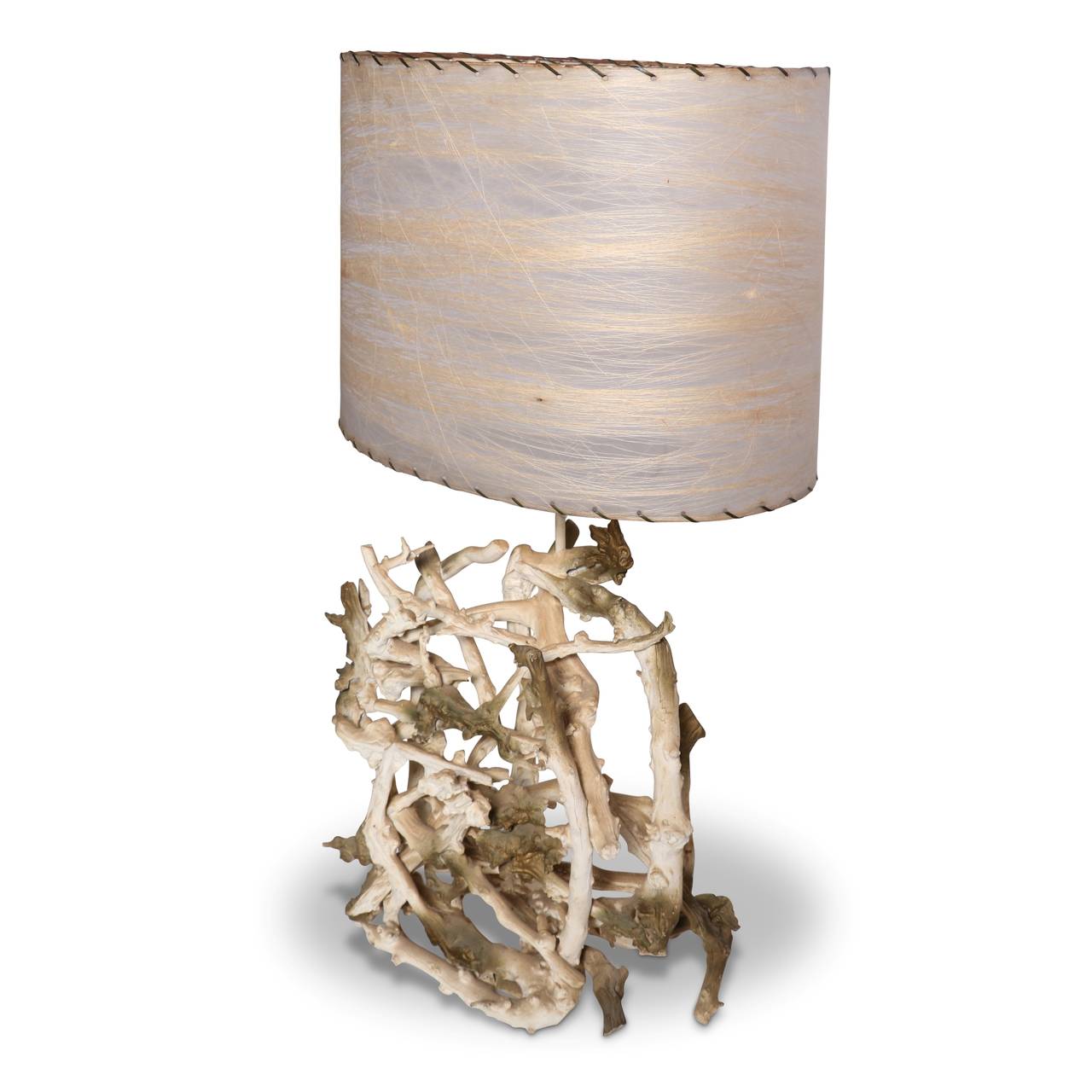 Mid-Century gesso washed driftwood table lamp with original fiber infused vellum shade and whip stitching. Original wiring.