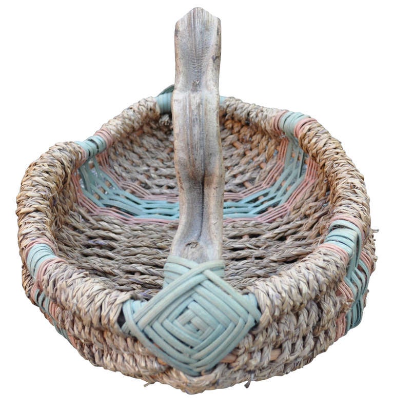 Early 20th c. three color basket with excellent handle.