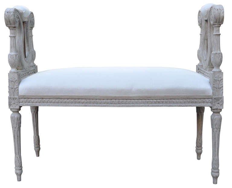 18th Century Harp Bench, upholstered in new white fabric.

The older High Gustavian style (1772-1785) is a Swedish version of the French Louis XVI style and carries some of the Rococo known features. The younger sengustavianska style was around