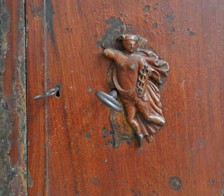 Painted metal cabinet with Goddess of medicine in relief. Secret secondary key-mechanism hiding extra keyhole.

NB:
Complimentary delivery within three hours drive of Haddonfield, NJ 08033. (Fx. DC, Baltimore, NYC or Hartford, Ct).