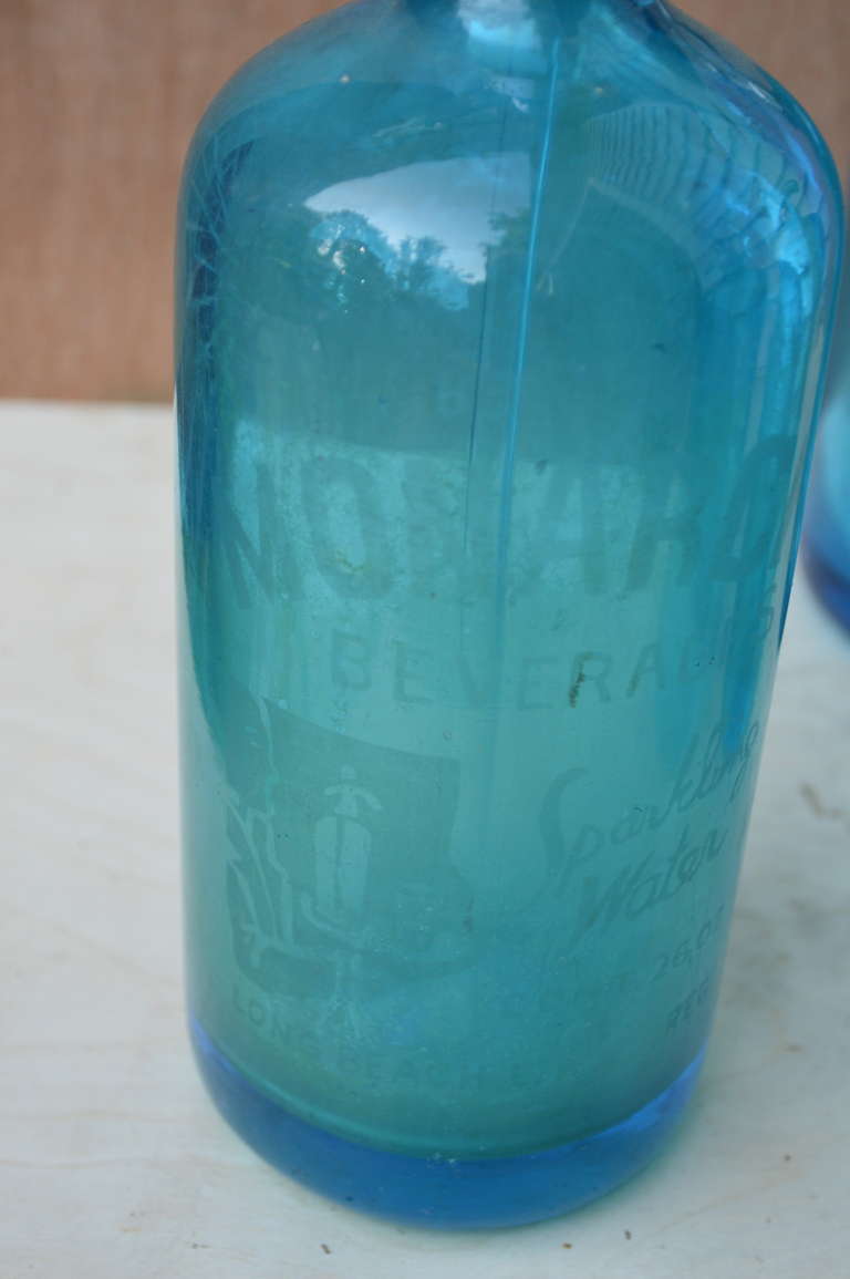 Four Azure-Blue Seltzer Bottles 1