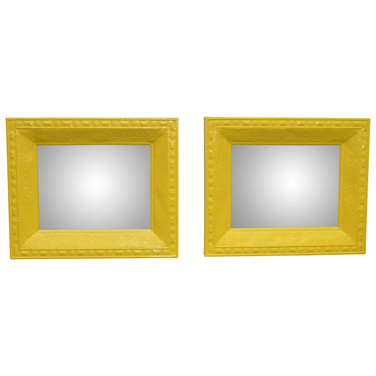 ONLY 1 LEFT
These sun yellow powder-coated metal mirrors are guaranteed to be the focal point of any room. Bamboo and leaf molded decor on frames with beveled mirror glass.
Metal (toleware) frames are from 1920's.
Sturdy wire that can be adjusted