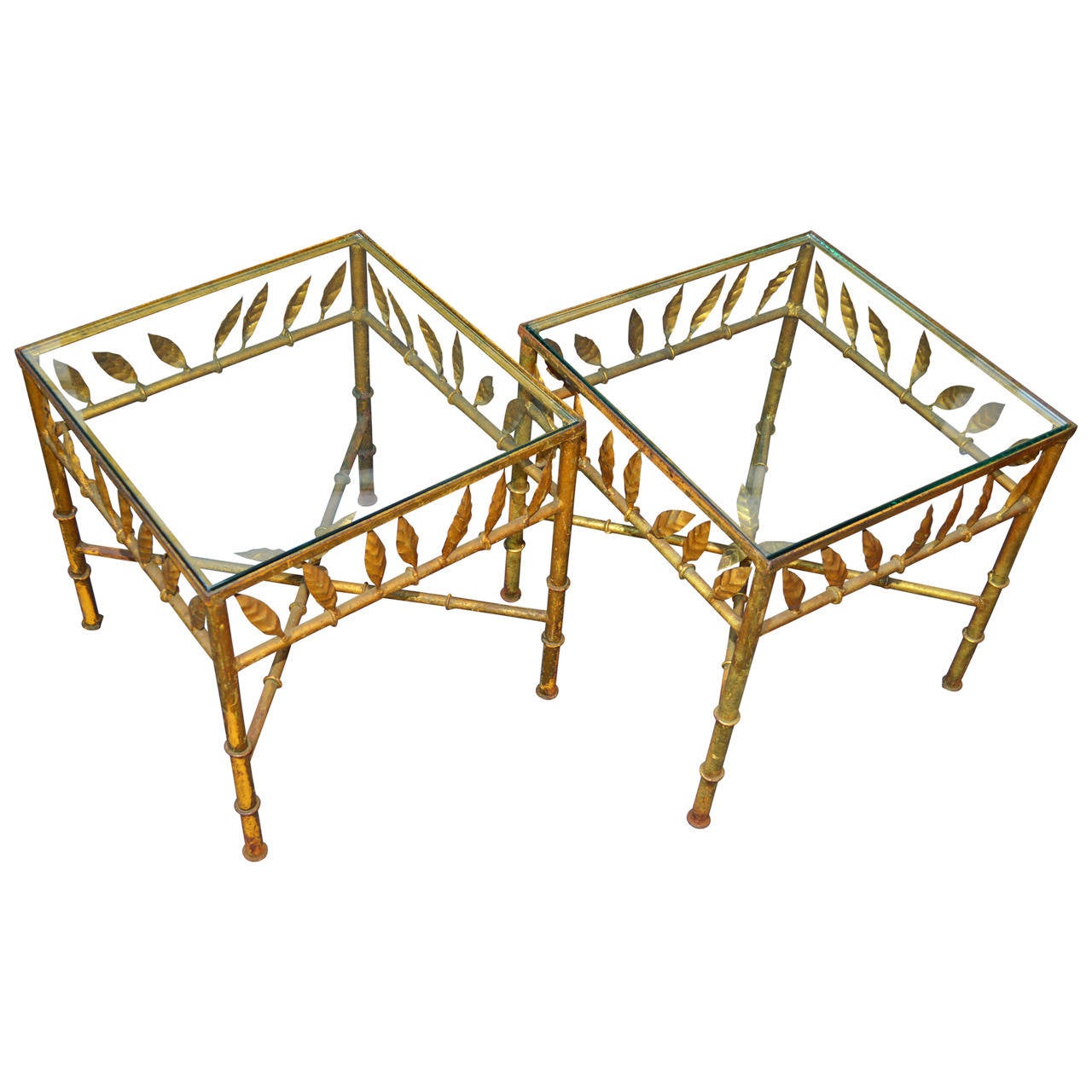 This is a beautiful pair of gilded leaf side tables. Can be used separate or together to create a versatile cocktail table.