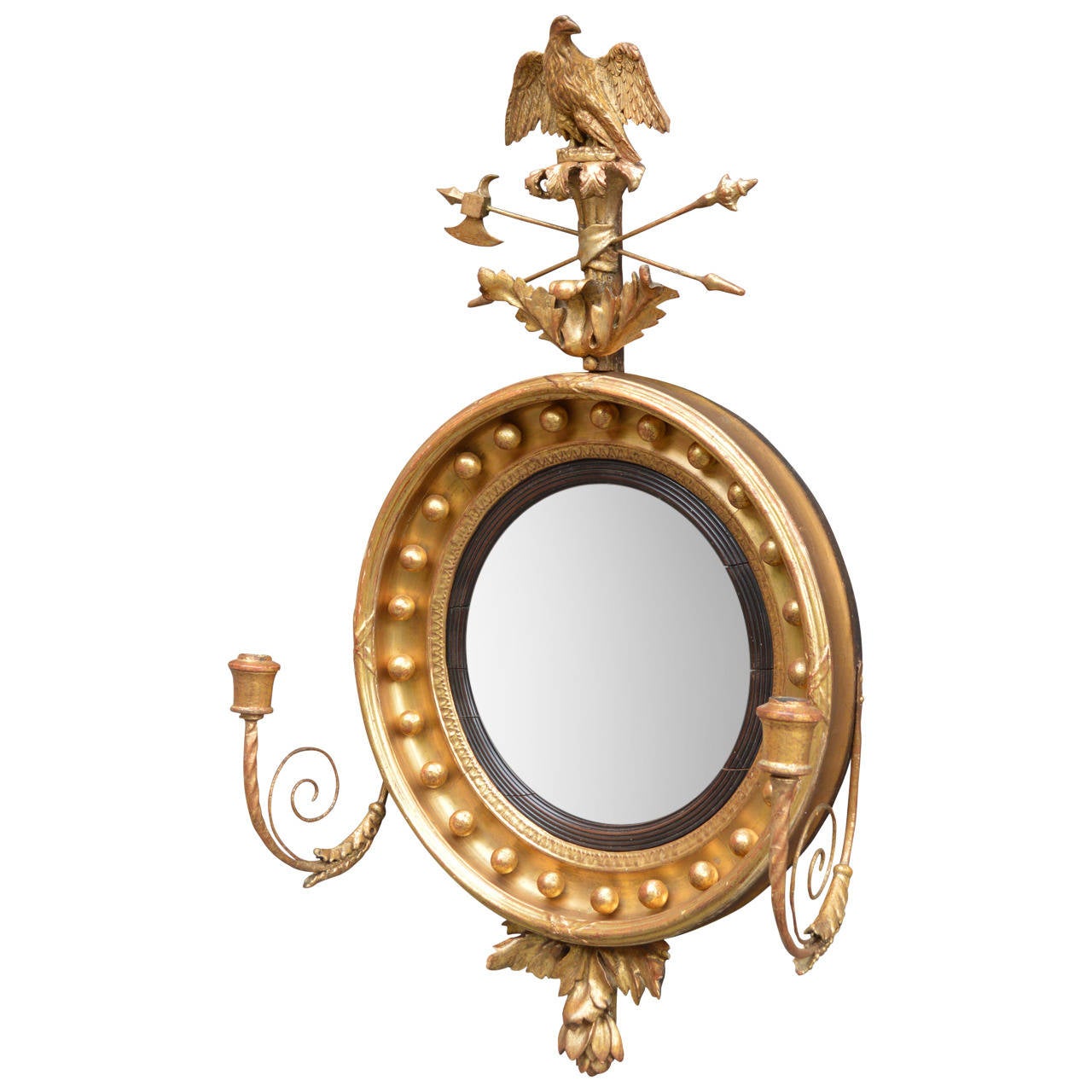 Beautiful convex butler's mirror finished in gold leaf over red poliment.  Original 11.38