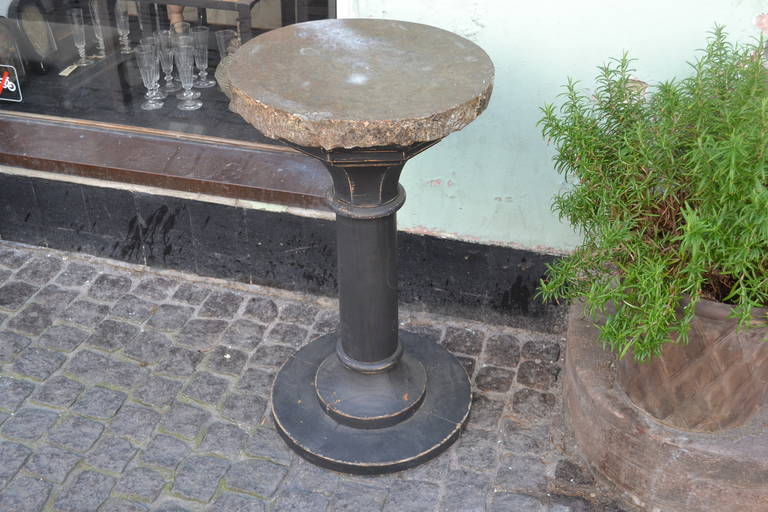 Swedish stone-top black pillar table stone is earlier than 1850 and has a beautiful natural rough underbelly.