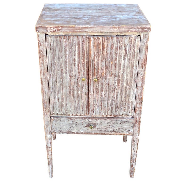 A beautiful Swedish nightstand with one drawer and double doors.