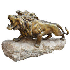 Grande sculpture de lion en bronze rugissant
