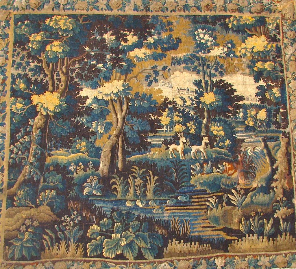 Large 17th or 18th Century gobelin tapestry with forest-scene with deers and castle in background.