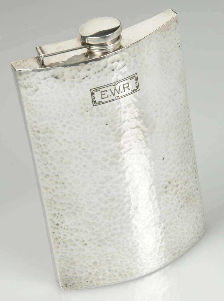 This is a great looking flask, having a wonderful hand hammered finish.