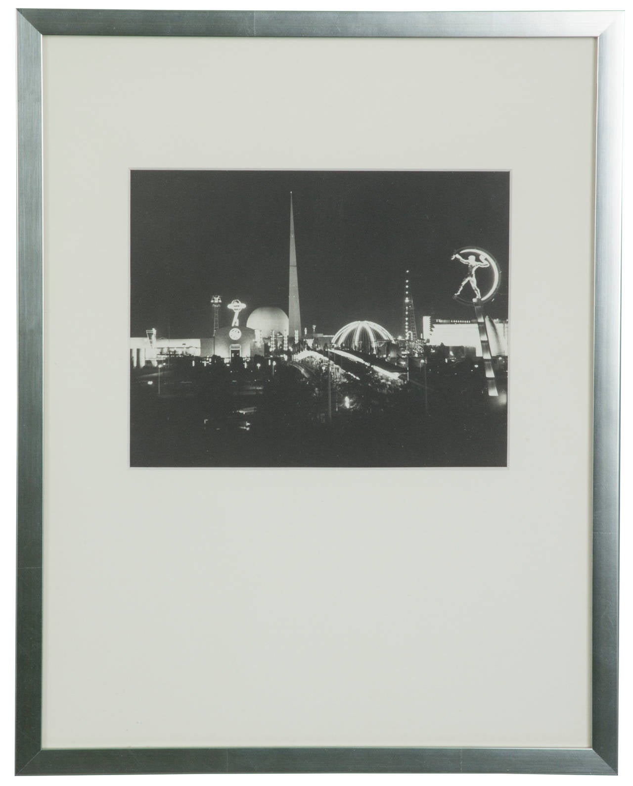This rare photograph shows the brilliance of the New York World's Fair at night. It is titled fair lights. Photograph dimensions are 7.25