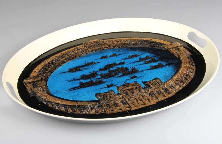 This is a wonderful large serving tray by Piero Fornasetti, having a beautiful blue color