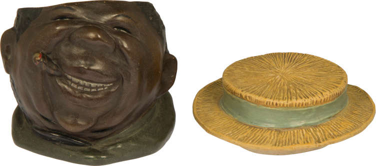 This is a humidor depicting a man of African descent  wearing a straw hat, enjoying a cigar in his mouth.