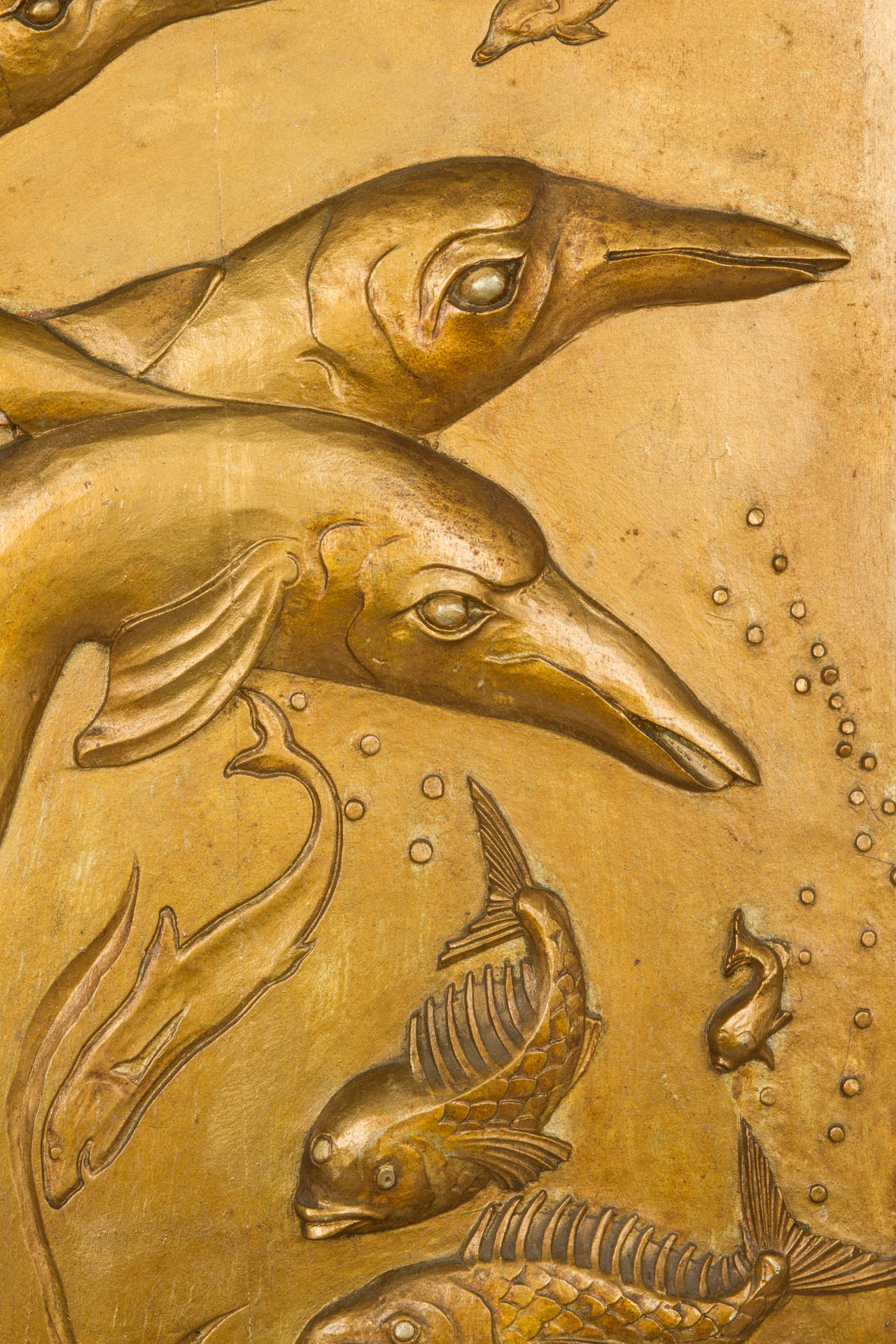 This is an interesting, whimsical piece depicting porpoise, and fish in an underwater three dimensional scene.