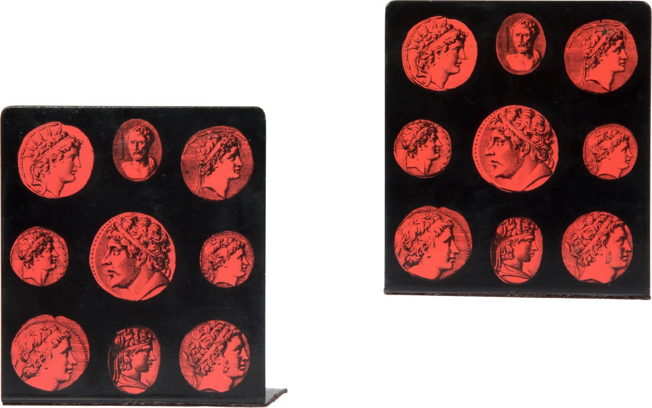 Pair of Fornasetti Roman portrait bookends. Great color on these bookends.