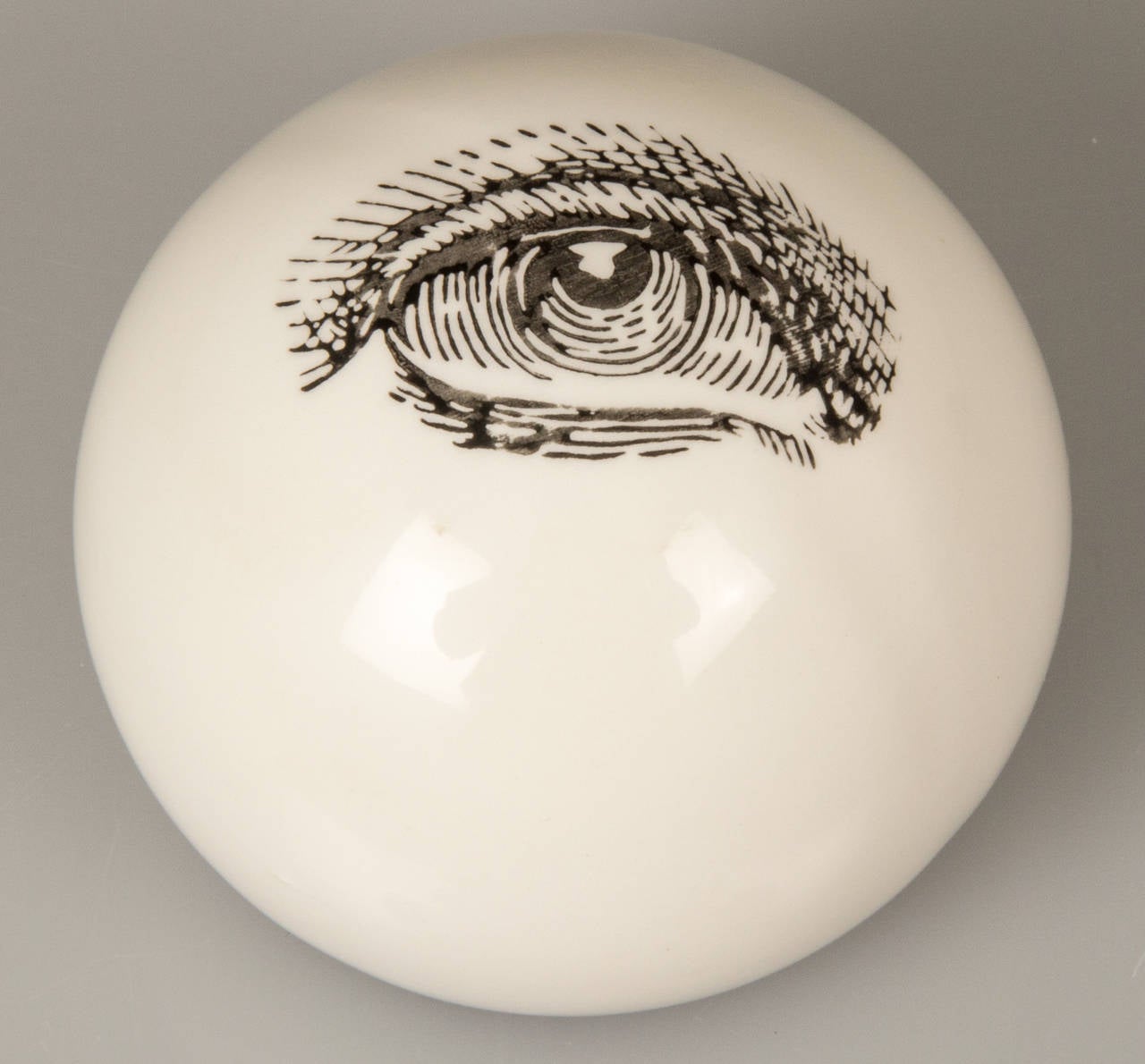 An unusual paperweight by Fornasetti.