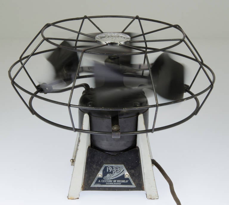 Distributed at the 1933 Worlds Fair Chicago, this fan remains on e of the most rare fans from this era.  The fan runs smoothly and quietly and is all original. It works perfectly once the switch is flipped on.

The identification plate on the side