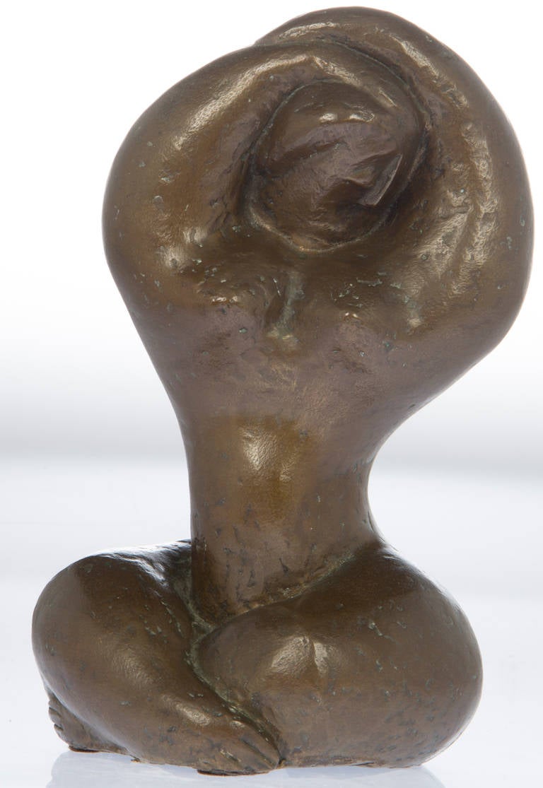 This is a luscious, earthy sculpture by Aaron Goodelman. She has a sensual physique with a warm patina.