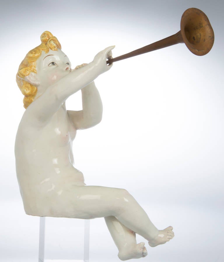 Italian Ceramic Sculpture of Cherub Blowing His Trumpet For Sale