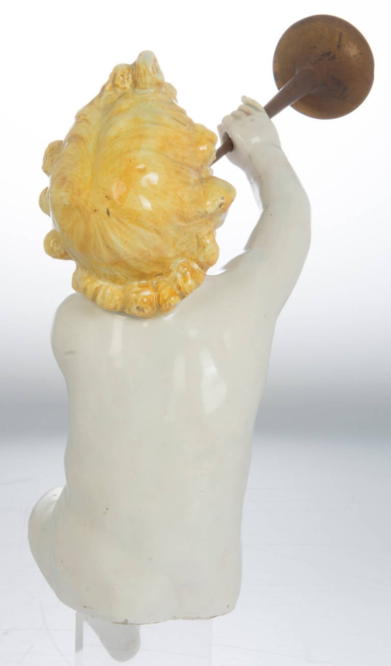 Mid-20th Century Ceramic Sculpture of Cherub Blowing His Trumpet For Sale