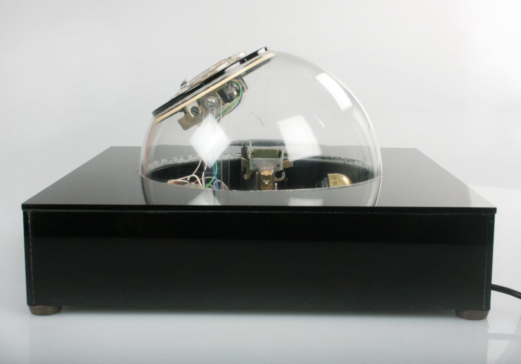 The retro sculptural design reflects our interest in outer space. The clear lucite bubble provides a window to the inside workings of the telephone. I believe this to be a rare model as we've never seen this before.