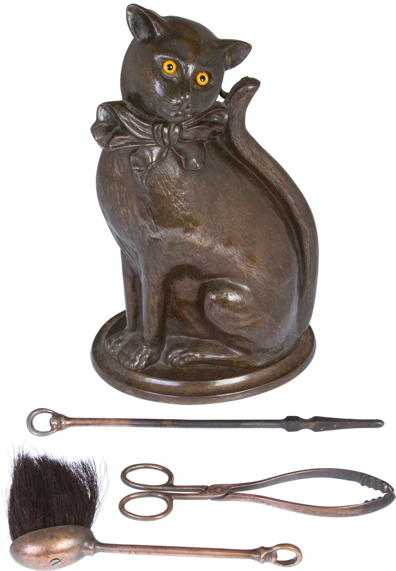 This bronze cat with glass eyes was made in England with the signature of Harry Banks BWS. Numbered 139 and inscribed on the back 