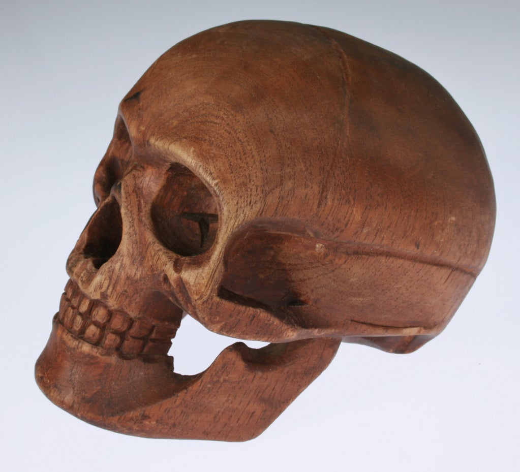 This is an interesting sculpture of a human skull.