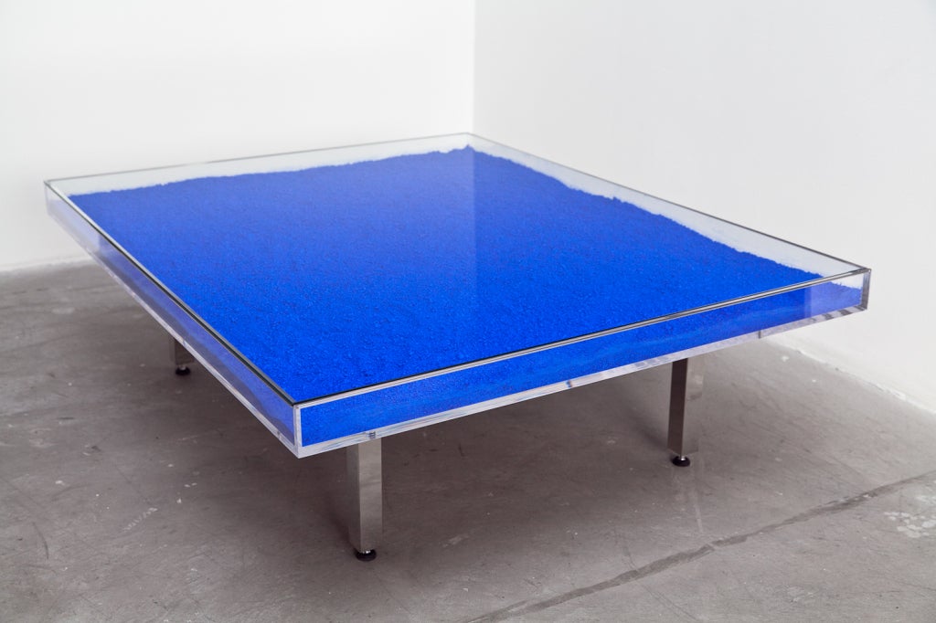 Glass top table filled with IKB pigment by artist Yves Klein.