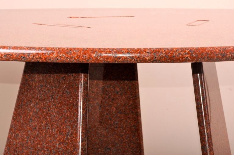 Asolo dining table

Skipper
Italy, 1981
 red Brazil granit