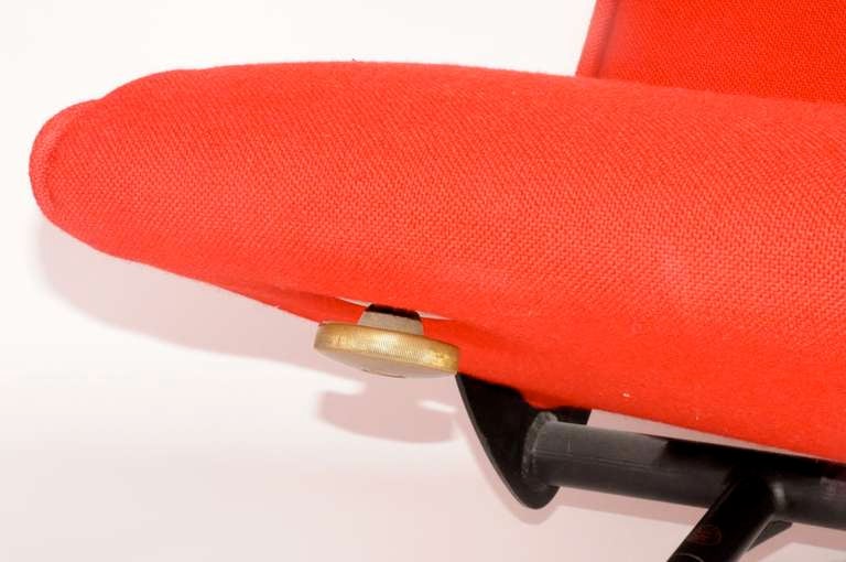 Early edition sofa by Osvaldo Borsani for Techno, 1954. This sofa easily adjusts into several positions and can face both sides (seat and back are equal in shape) and it can be put in a flat position to use as a daybed. Newly upholstered in RED 